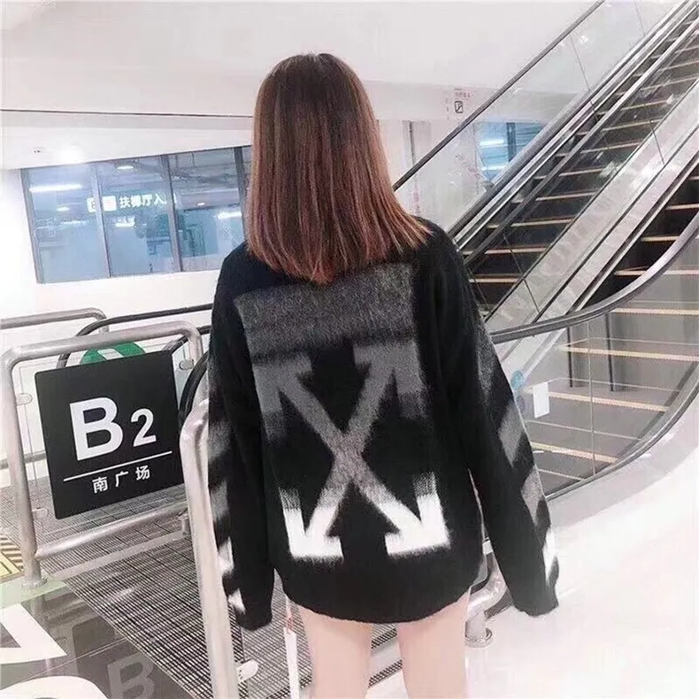 ♻️💯Reference model picture for the upper body❤️New top tested version OFFWHITE (OW) Gradient Mohair Striped Arrow Sweater Hoodie Gradient Rendering Arrow Couple Sweater Mohair sweater ow family will release every year🛒 The same style and ever-changing colors, really no girl does not love it, it is super suitable for wearing under a down jacket in winter, and will not be bloated! If the lower body is missing, their favorite os version🙋🏻‍♀️ intuitively adds natural softness and fairy beauty effect, which is the best choice! The upper body is lightweight and does not weigh down the body while keeping warm. The sleeves and the gradient arrow parts on the back are repeatedly patterned until the gradient level is satisfied before large-scale products are released. The craftsmanship is extremely demanding. Each sweater is woolen at least ten times to give it a plush, thick feel and good fluffiness! ✅ Fabric composition: 50% mohair 32 spandex 18% wool, three-level anti-pilling Color: black and white gradient Sizes Mohair is lighter and softer, so be careful not to machine wash it, not machine washable! ! emphasize! !  ⚠️Hand wash with warm water and cold water P:440